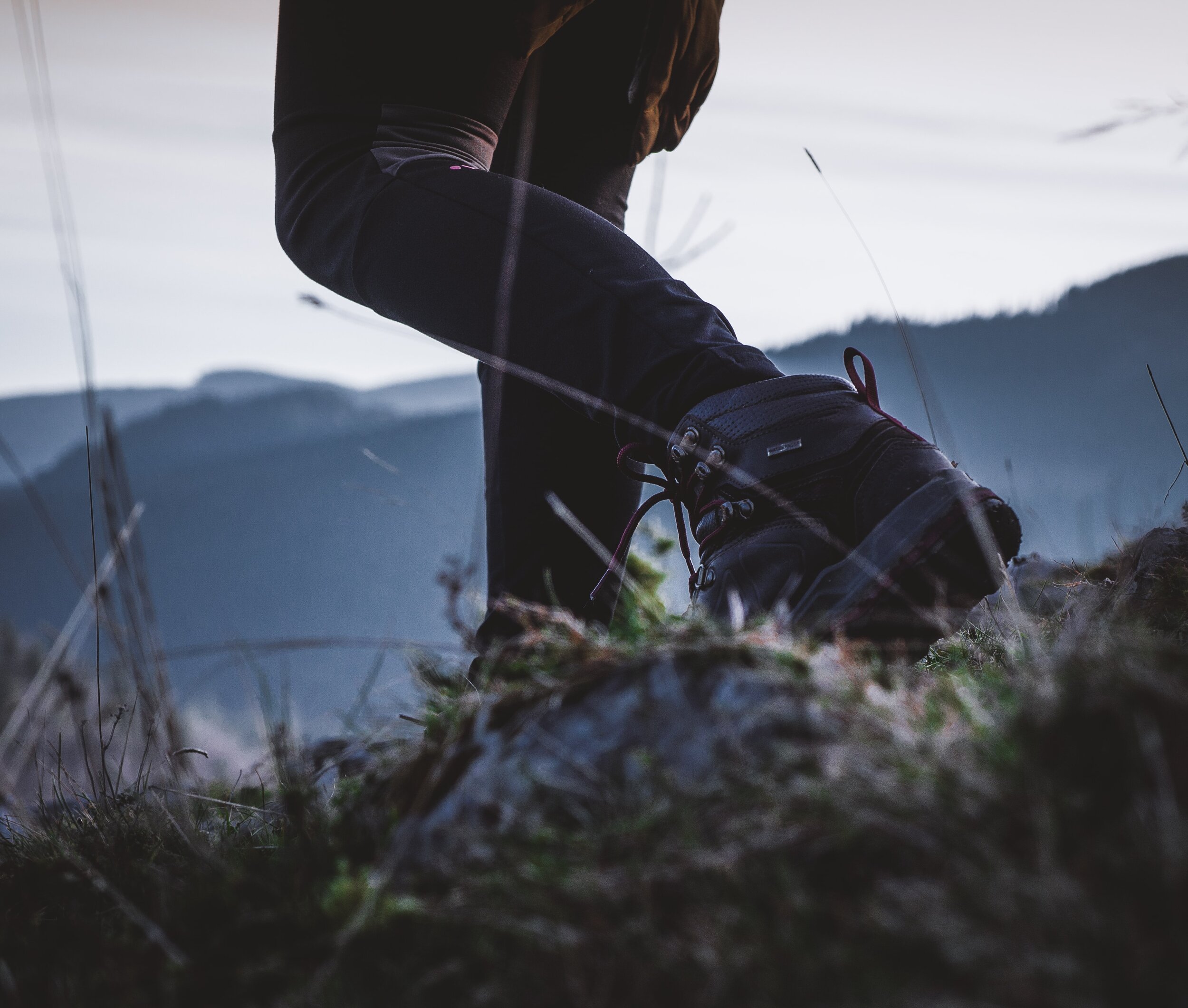 person walking with hiking boots